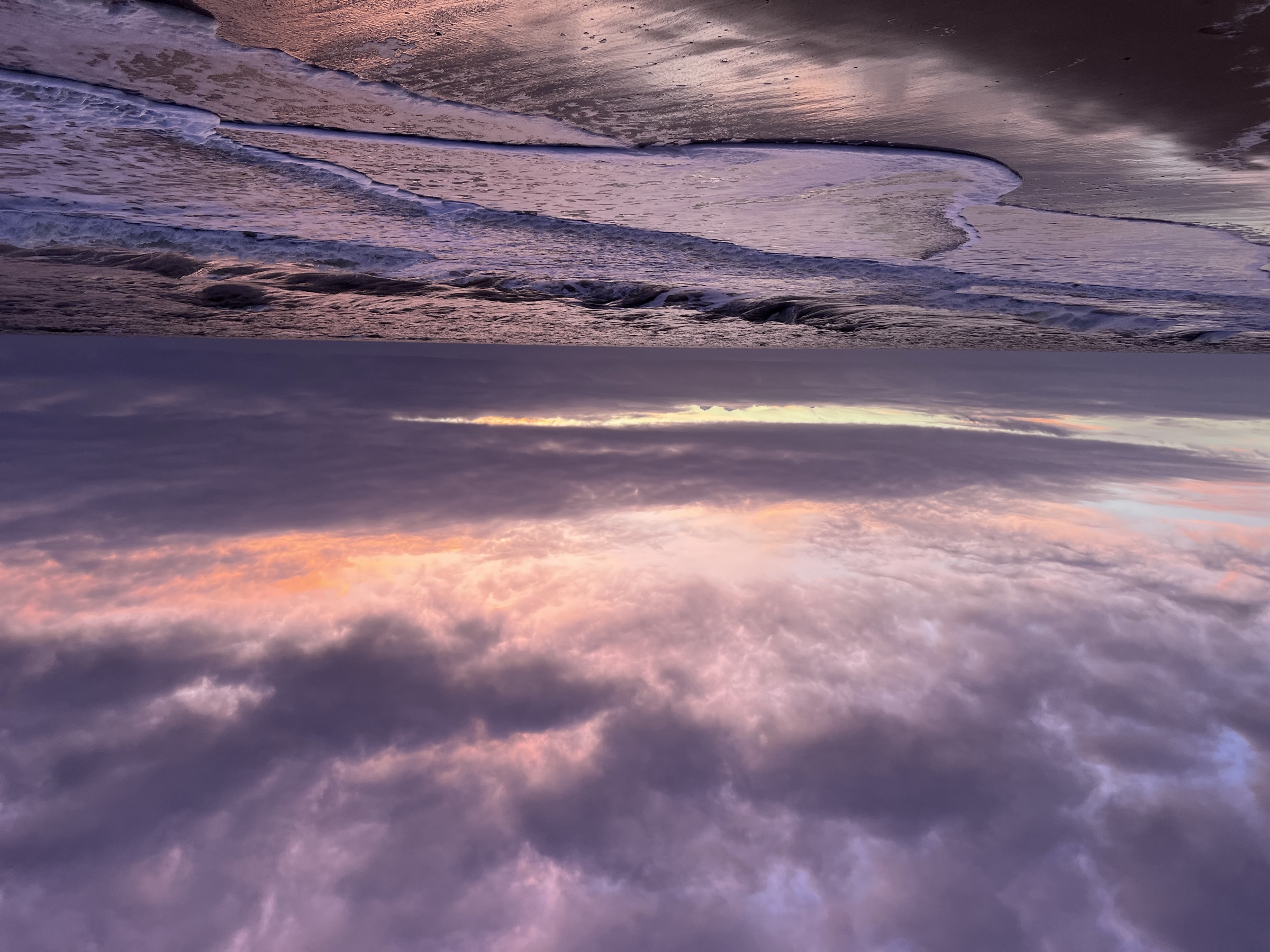 Pink dusk with white surf