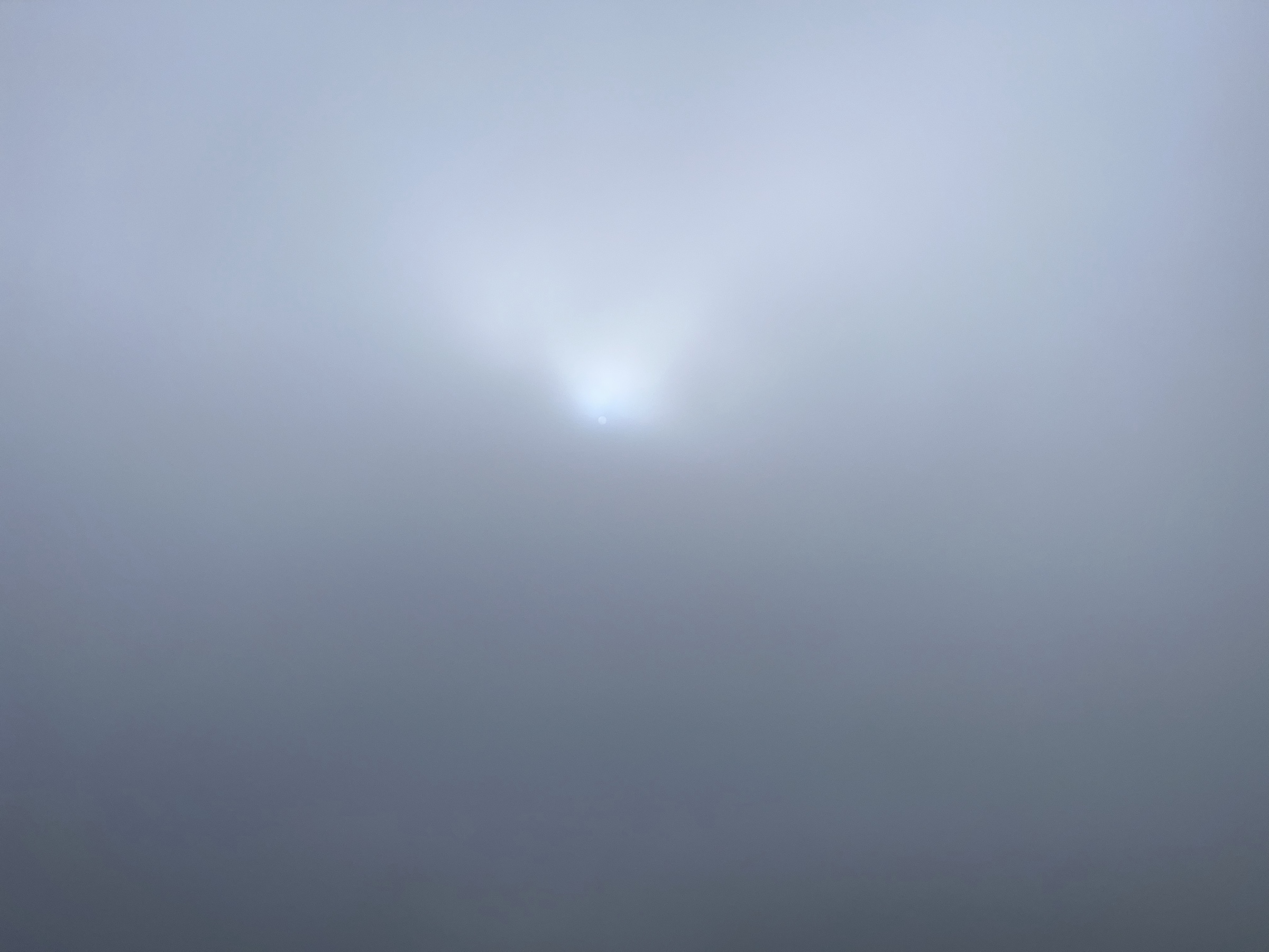 Sun disc through fog